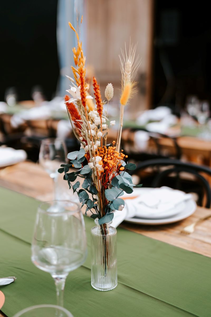 Simple bud vases along the tables